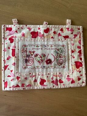 Handmade quilted and embroidered “love” wall art